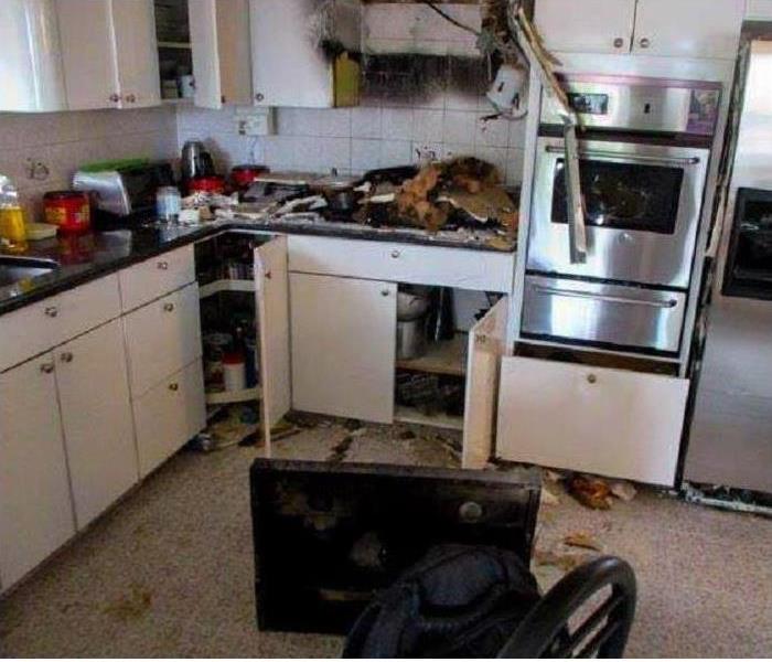 stove top removed, burned, burned wall by microwave