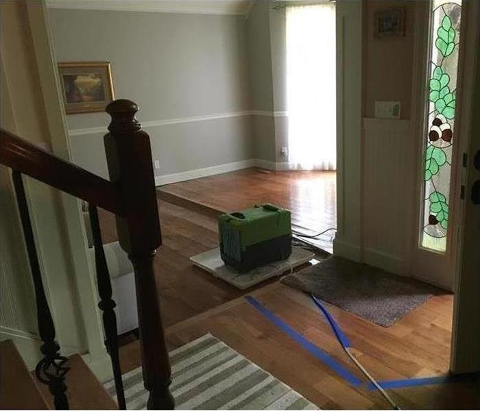 warped flooring, dehumidifier in room