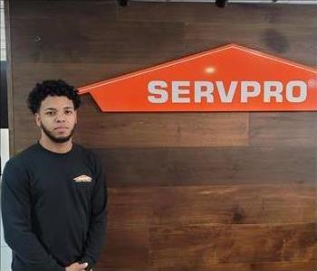 man posing black servpro shirt beard