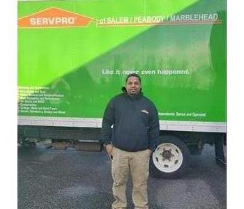 male posing front of truck