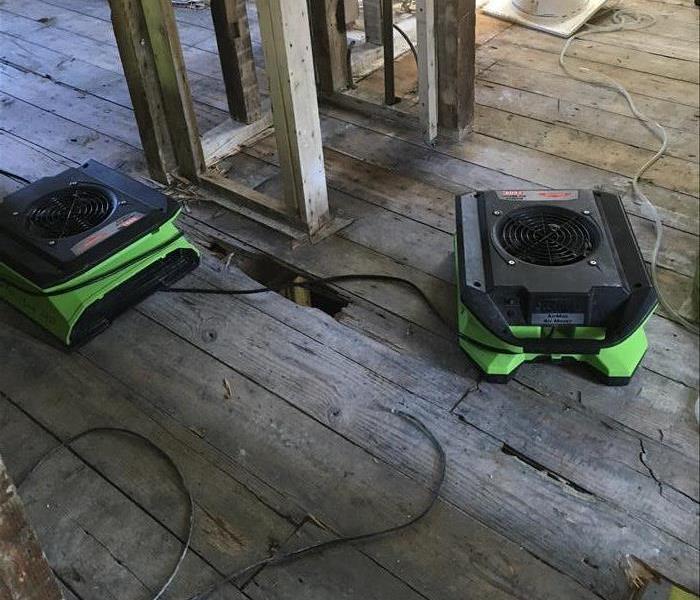 bare floor wood and framing, equipment working