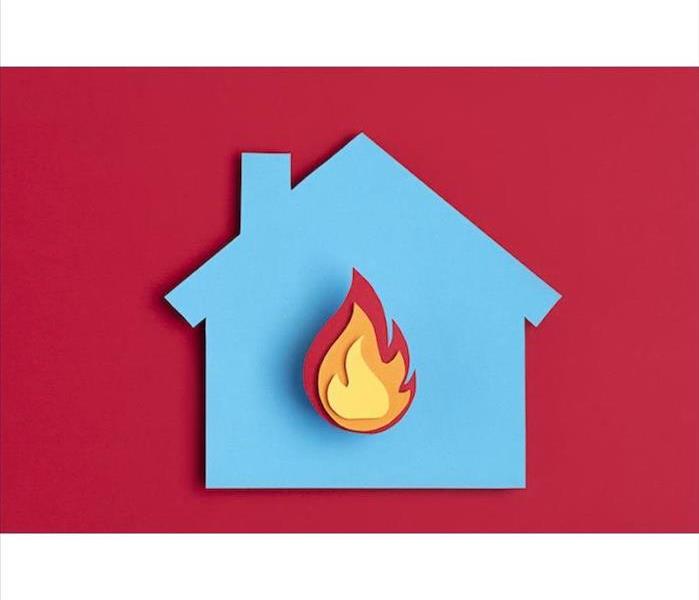 A blue cut out of a home with fire inside on a red background